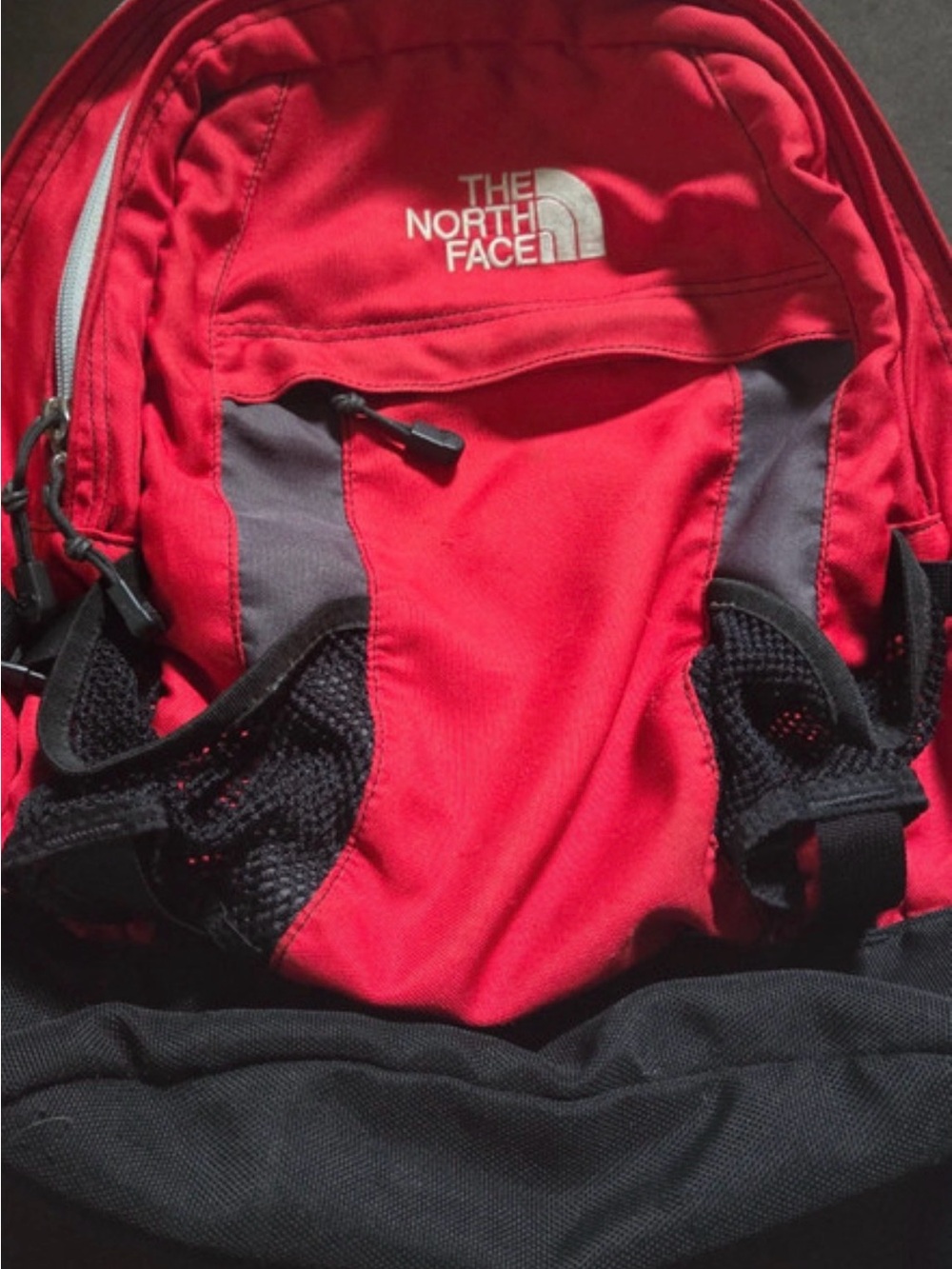 The North Face Red and Black Daypack Backpack